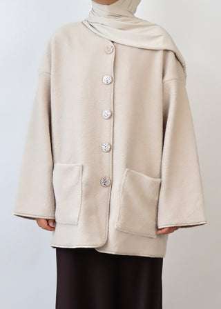 Mantel mit Knöpfen aus Teddyfleece| Beige